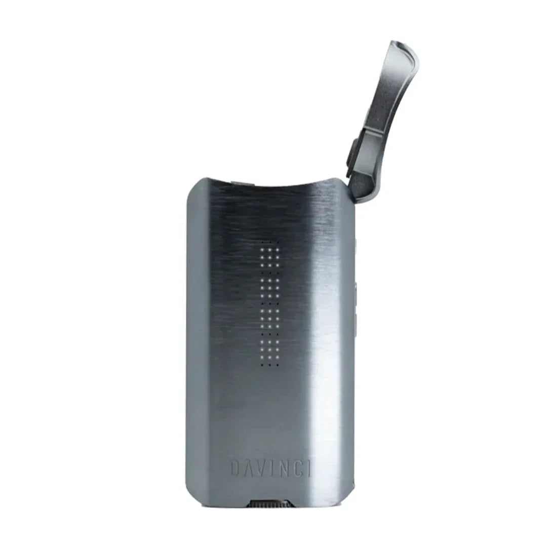 Sleek silver portable dry herb vaporizer with flip-top lid and LED indicator lights