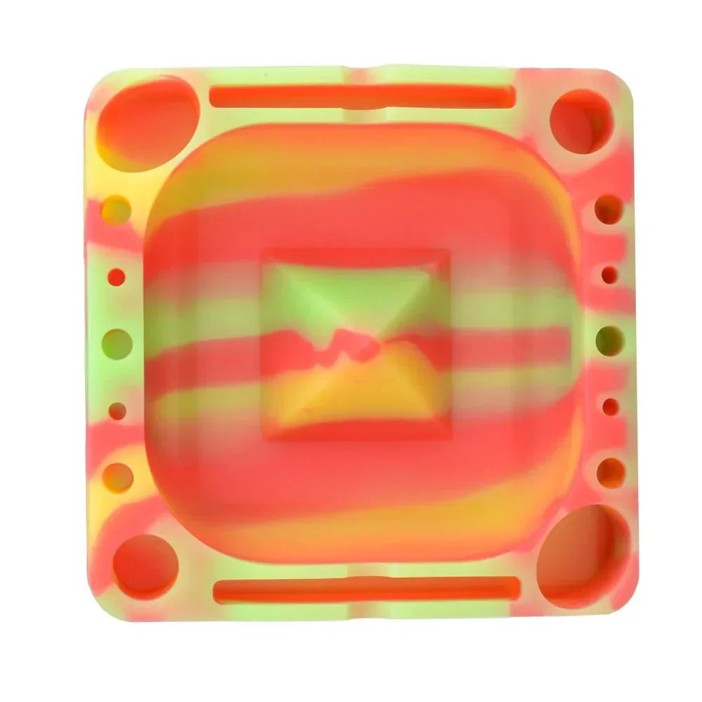 Square silicone ashtray with neon red, yellow, and green swirls and multiple holder slots