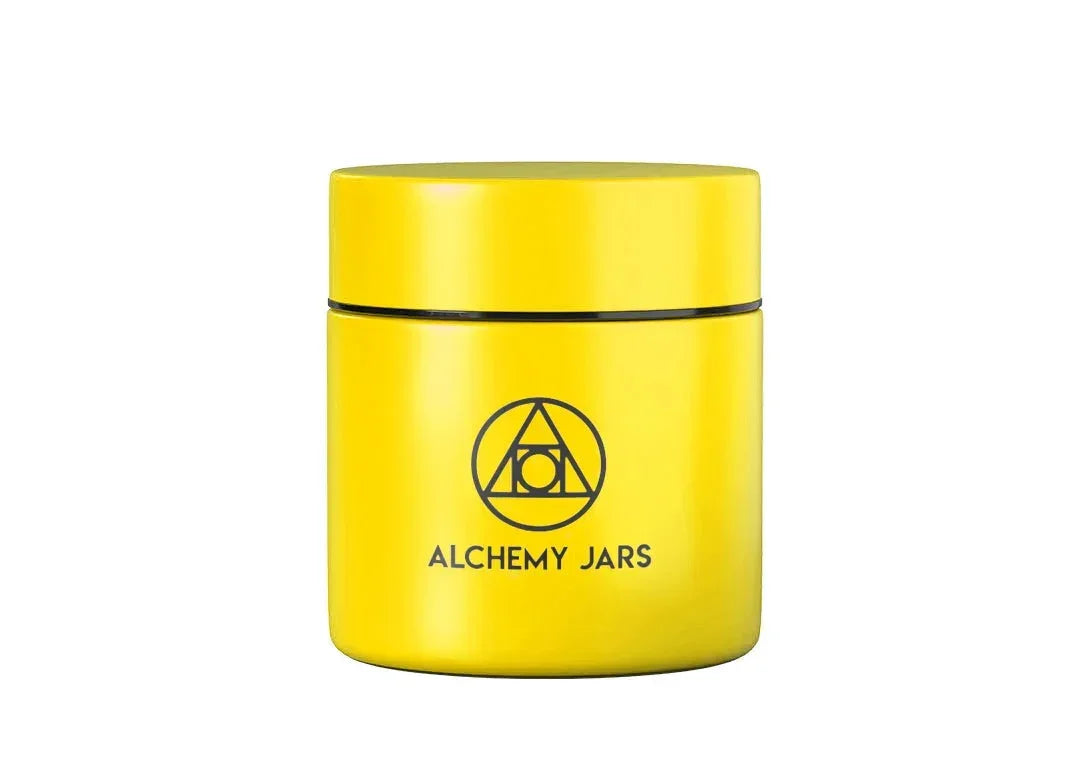 Yellow Alchemy Jars airtight storage container with geometric logo on white background