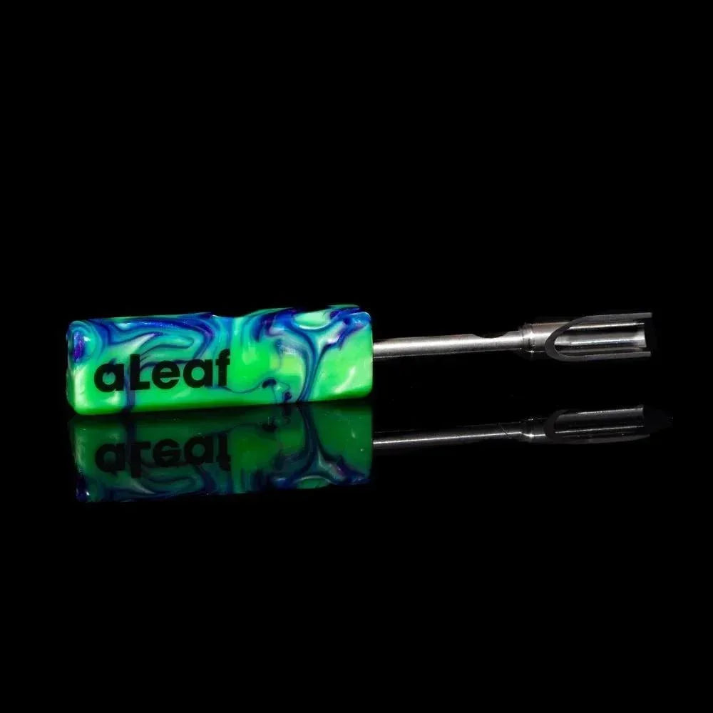 Resin dab tool with green and blue swirled handle and stainless steel scoop tip