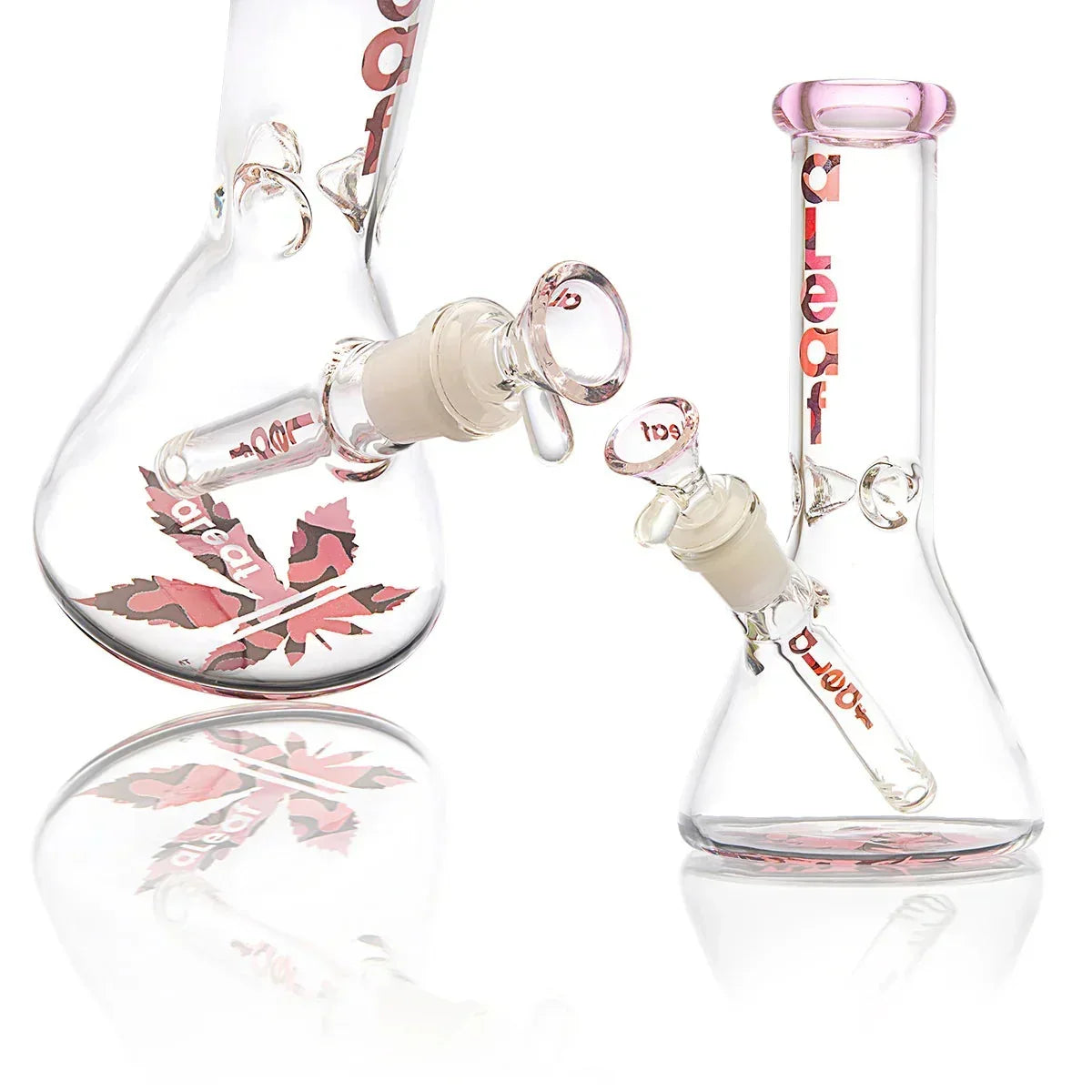 Clear glass beaker bong with pink accents, leaf design, downstem and bowl attachment