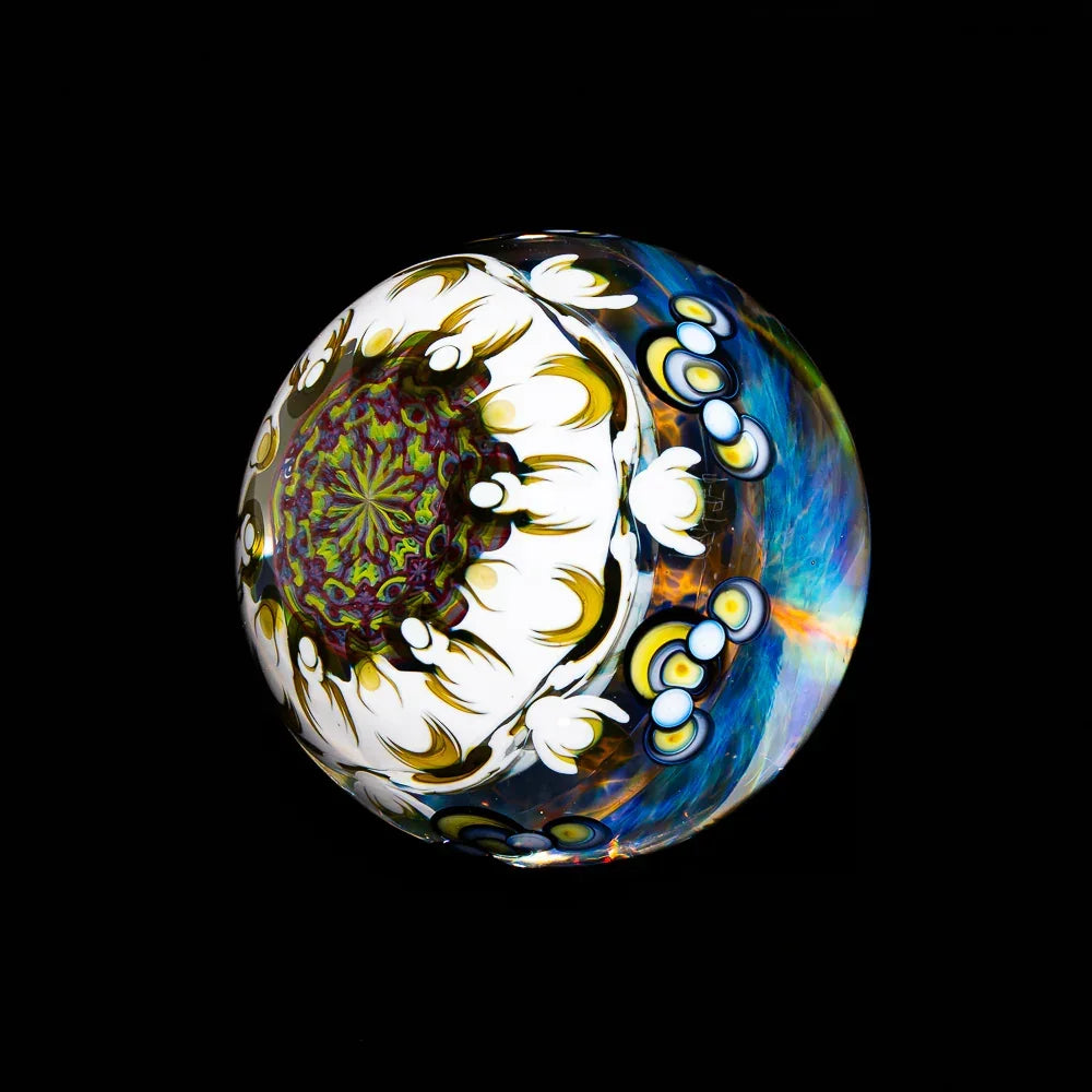 Intricate heady glass marble with colorful patterns and floral designs on a black background