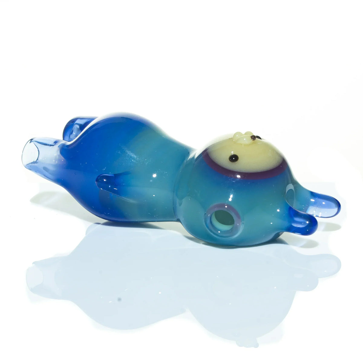 Aquarius blue fade glass hand pipe shaped like a cartoon animal with clear details