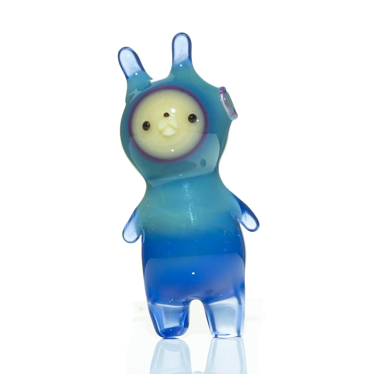 Aquarius blue fade glass figurine with cartoon animal design and clear gradient coloring