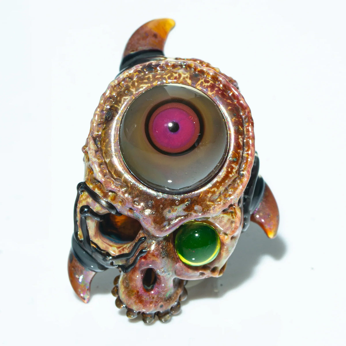 Handcrafted glass cyborg skull pendant with large pink eye, green gem, and metallic details