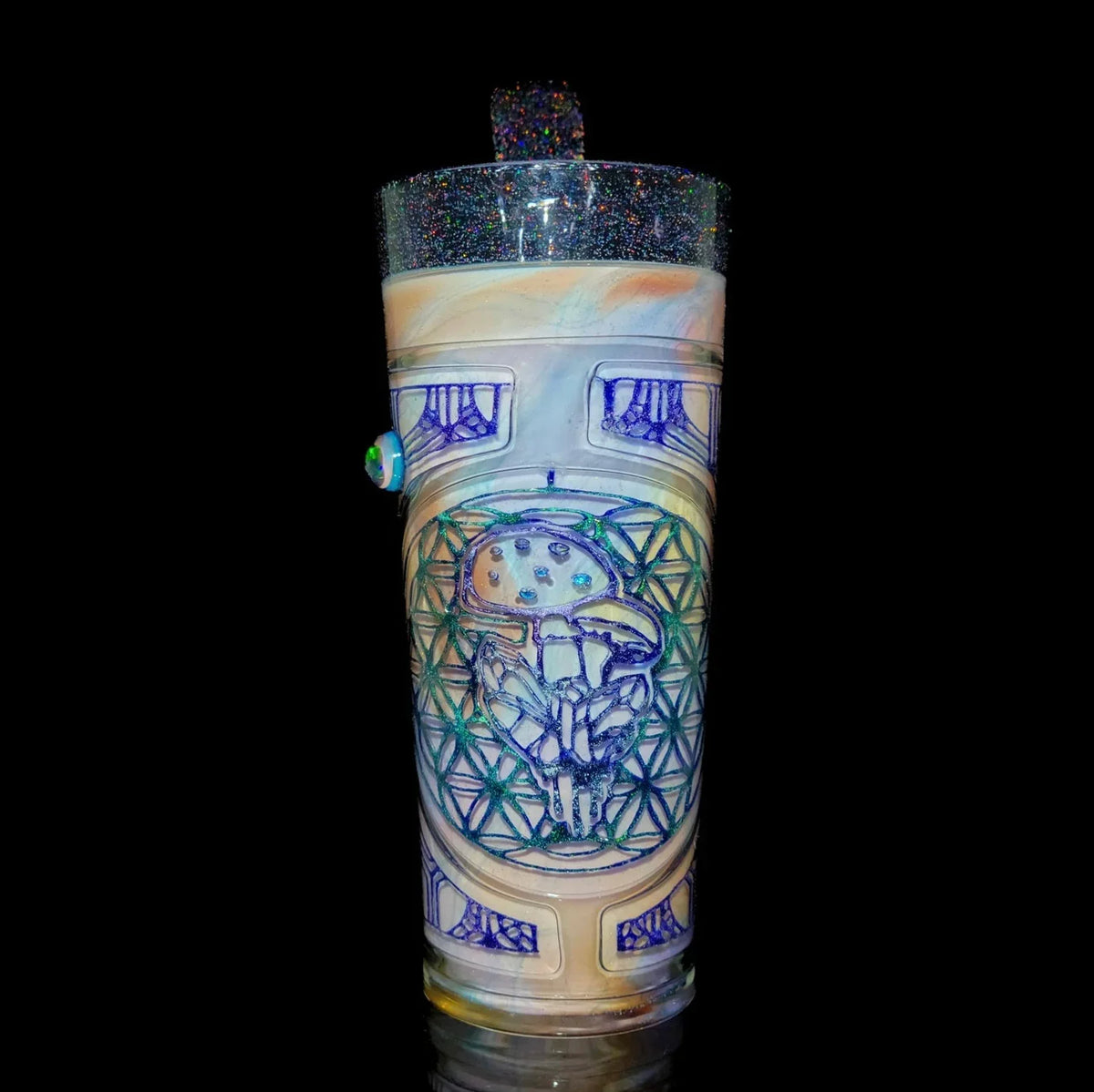 Heady glass sippy cup with psychedelic mushroom design and iridescent accents on black background