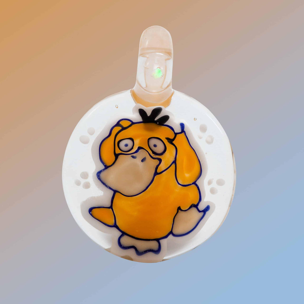 Handcrafted glass Psyduck pendant with vibrant orange and white details on a gradient background