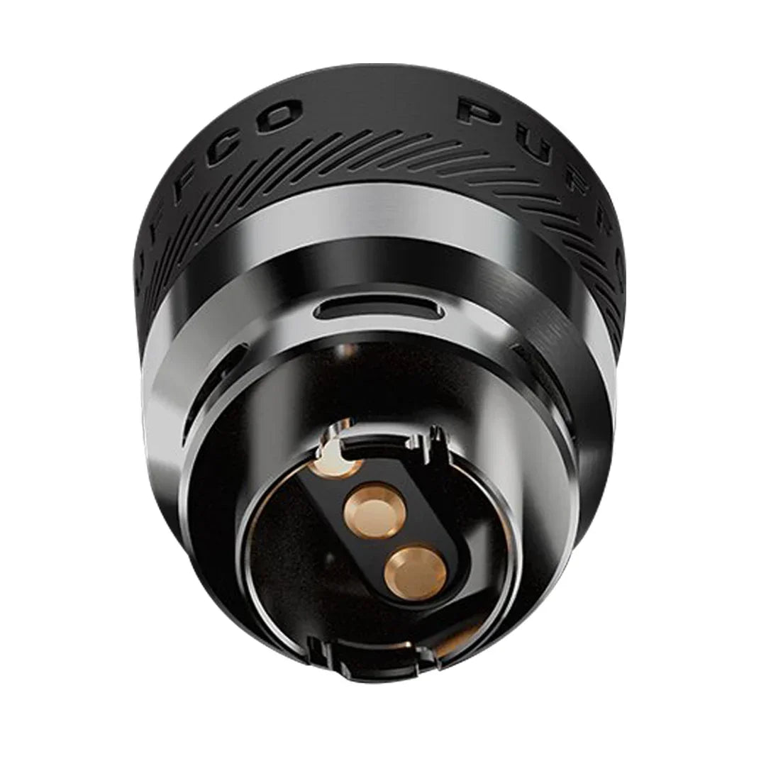 Close-up of a Puffco black ceramic chamber atomizer with visible contacts, isolated on white.