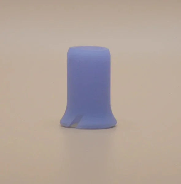 Blue silicone vaporizer mouthpiece accessory on plain background