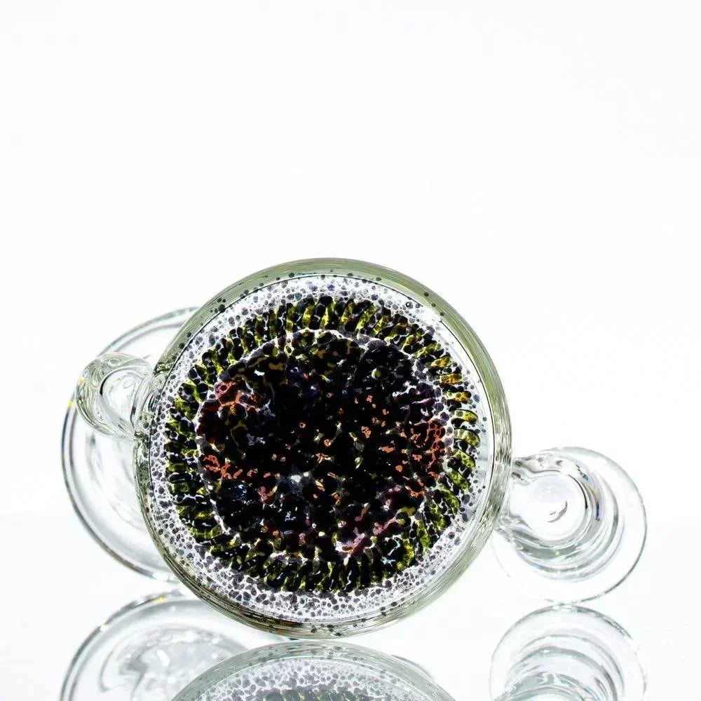 Heady glass pipe with intricate black, yellow, and white textured design on bowl