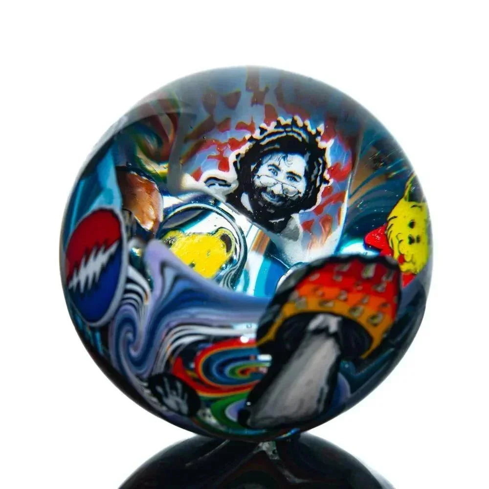 Colorful glass marble featuring psychedelic art, iconic bear, mushroom, and vibrant swirls