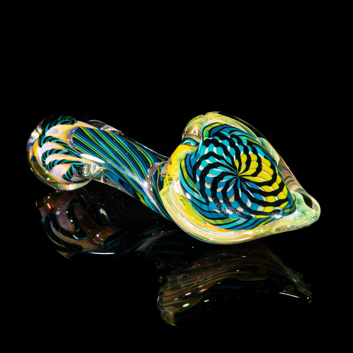 Colorful blue, teal, and chartreuse reticello glass hand pipe with intricate patterns