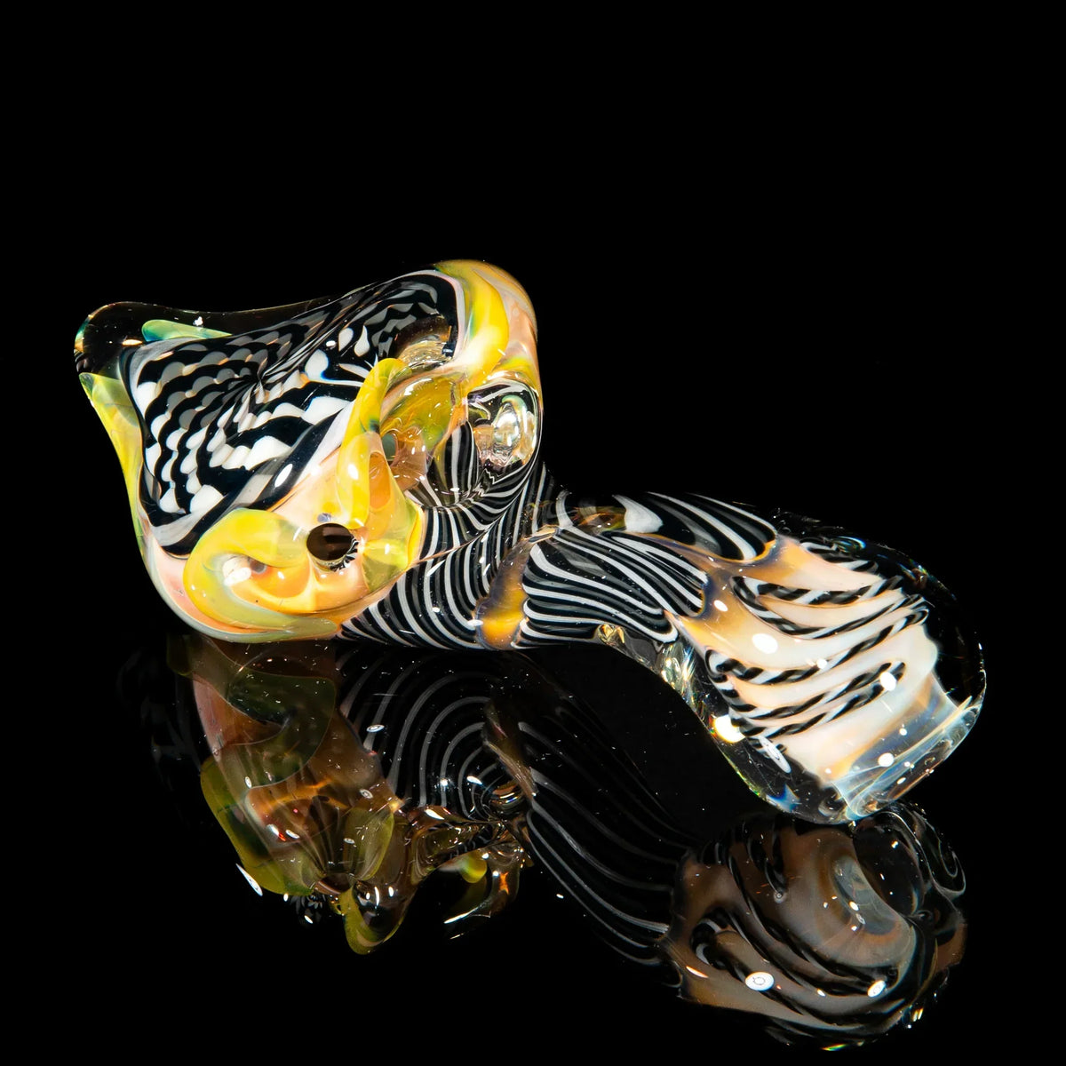 Hand-blown glass Sherlock pipe with black, white, and gray Reticello pattern on black background