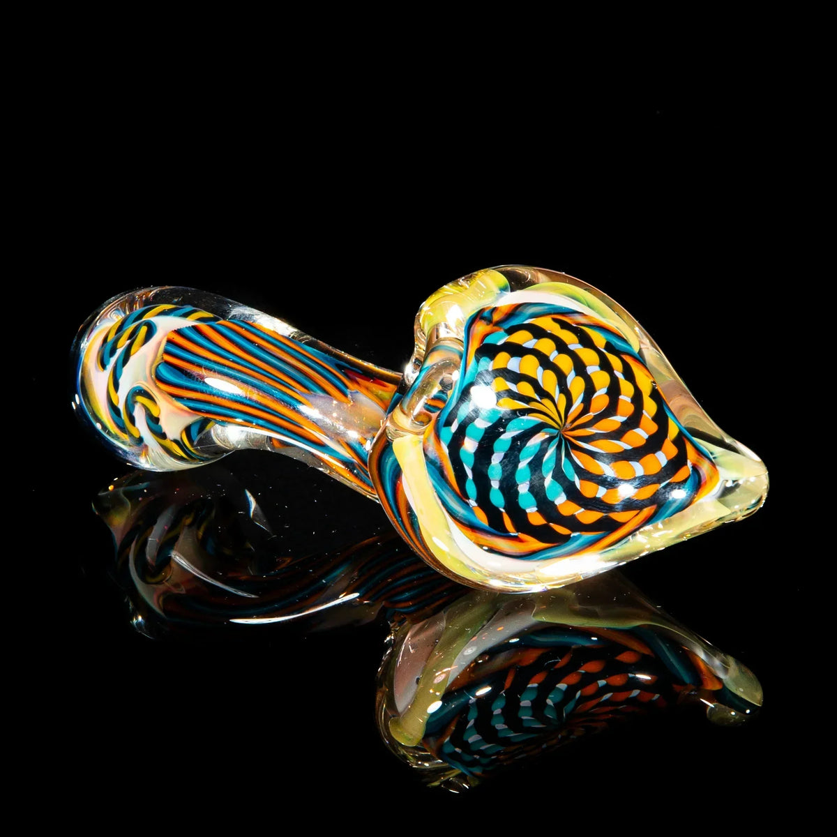 Hand-blown glass sherlock pipe with teal, orange, and yellow reticello design on black background.