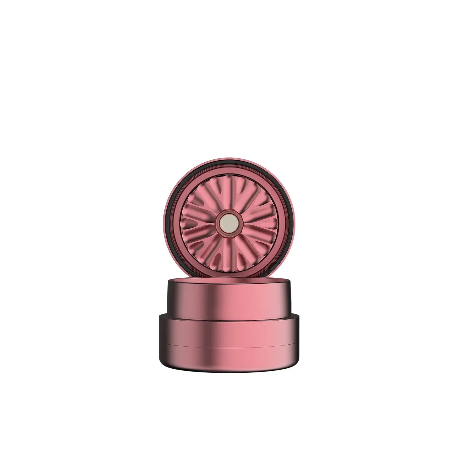 Metallic pink herb grinder with magnetic lid and flower-shaped teeth on white background