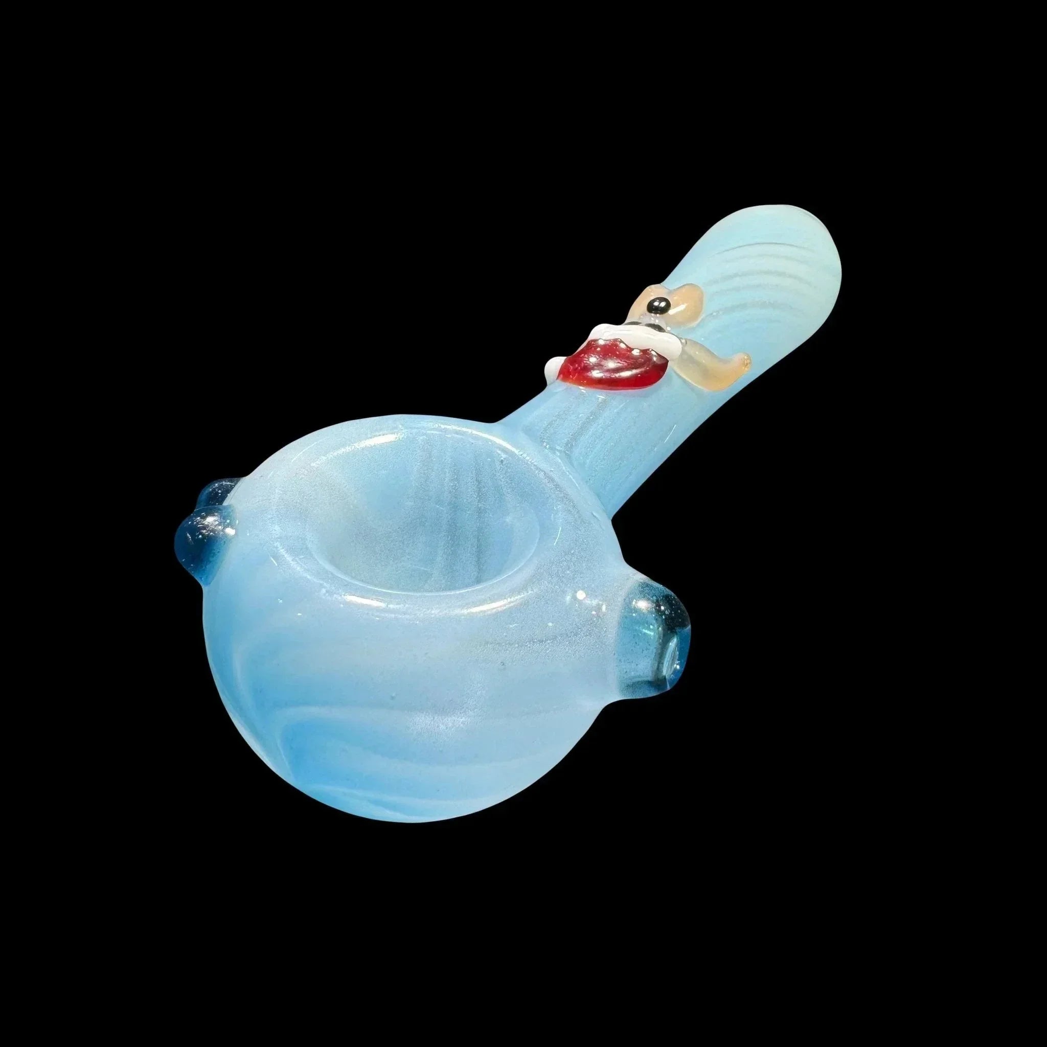 Light blue glass hand pipe with cartoon character accent on stem, isolated on black background