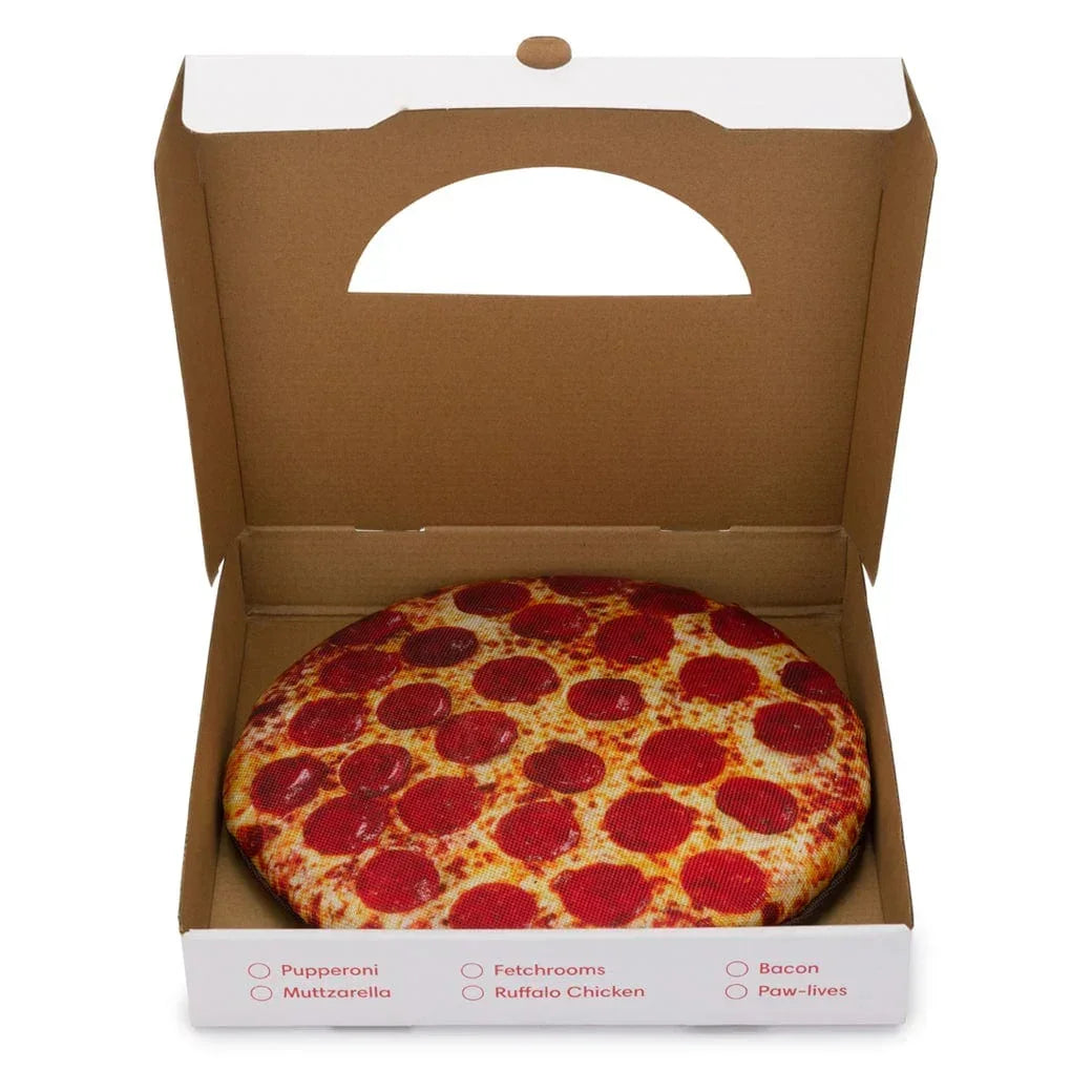 Pizza-themed plush toy dog bed in open pizza box with pepperoni print design