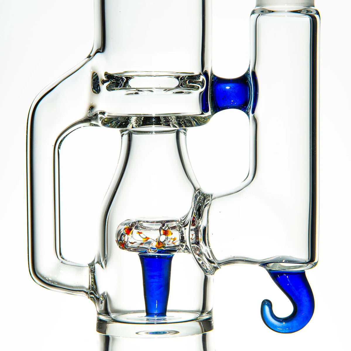 Heady glass art pipe with unique cobalt blue accents and intricate clear glass details