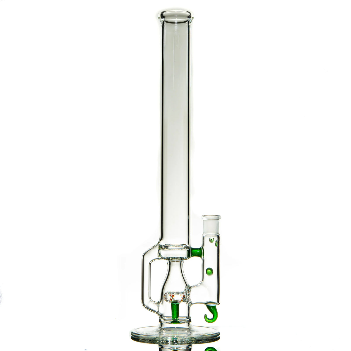 Clear glass water pipe with green accents and a cylindrical chamber on a white background.