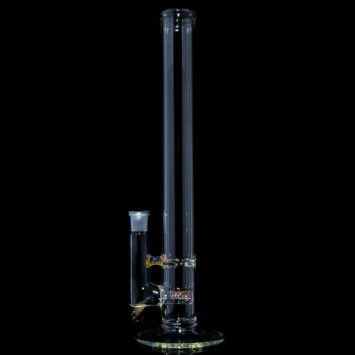 Tall clear glass water pipe with yellow accent and unique percolator on black background