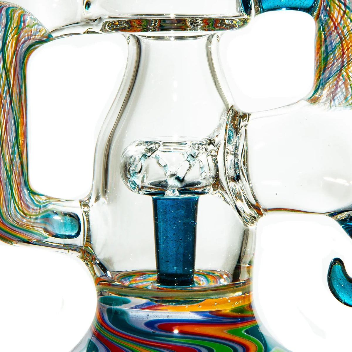Close-up of a colorful heady glass water pipe with intricate rainbow linework and blue accents