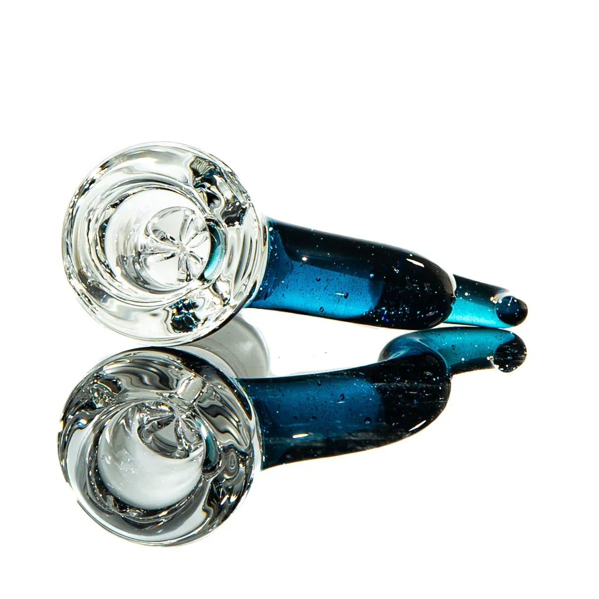Blue glass hand pipe with clear bowl, reflected on a white background