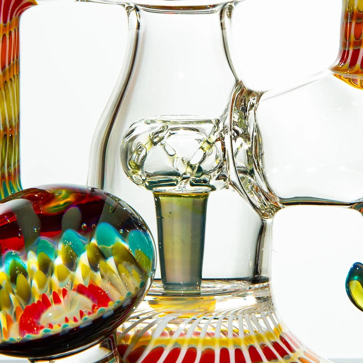Close-up of a colorful heady glass water pipe with intricate patterns and clear details