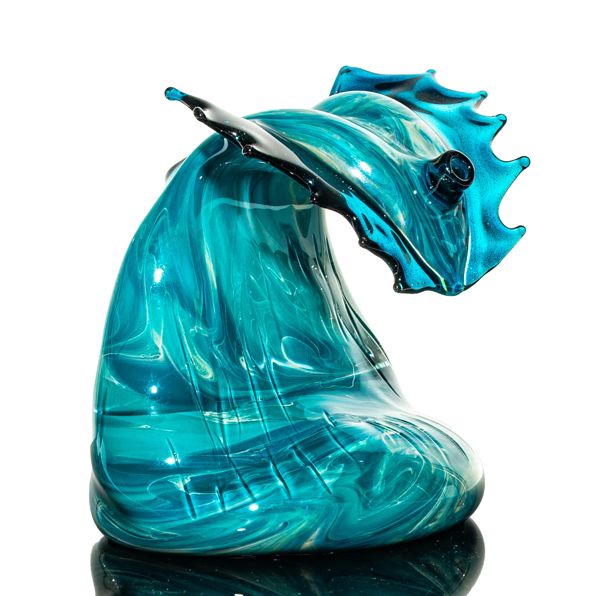Aqua azul hand-blown glass dab rig with a wave design by C Glass x Black Sand Glass