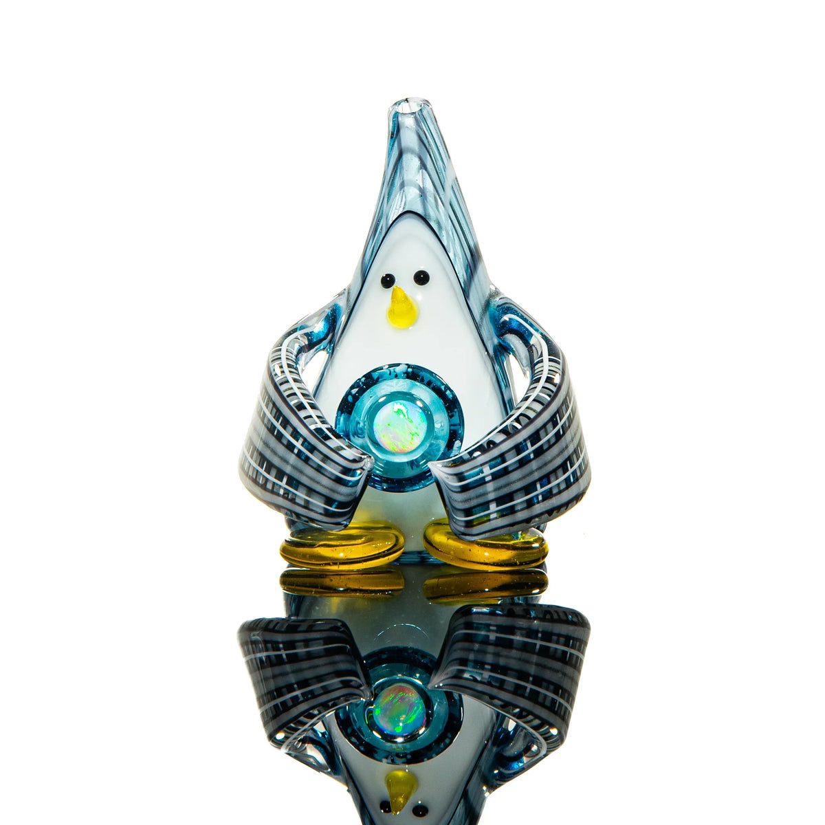 Handcrafted glass penguin pipe with blue accents and opal detail, on white background
