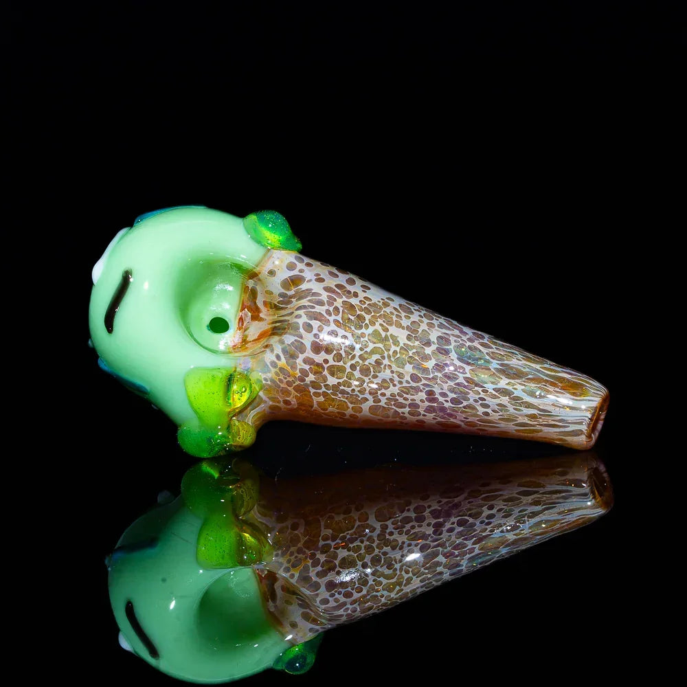 Hand-blown glass pipe shaped like a pistachio ice cream cone with detailed colors and texture.