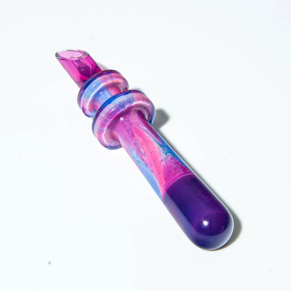 Colorful glass dab tool with pink, purple, and blue swirls on a white background