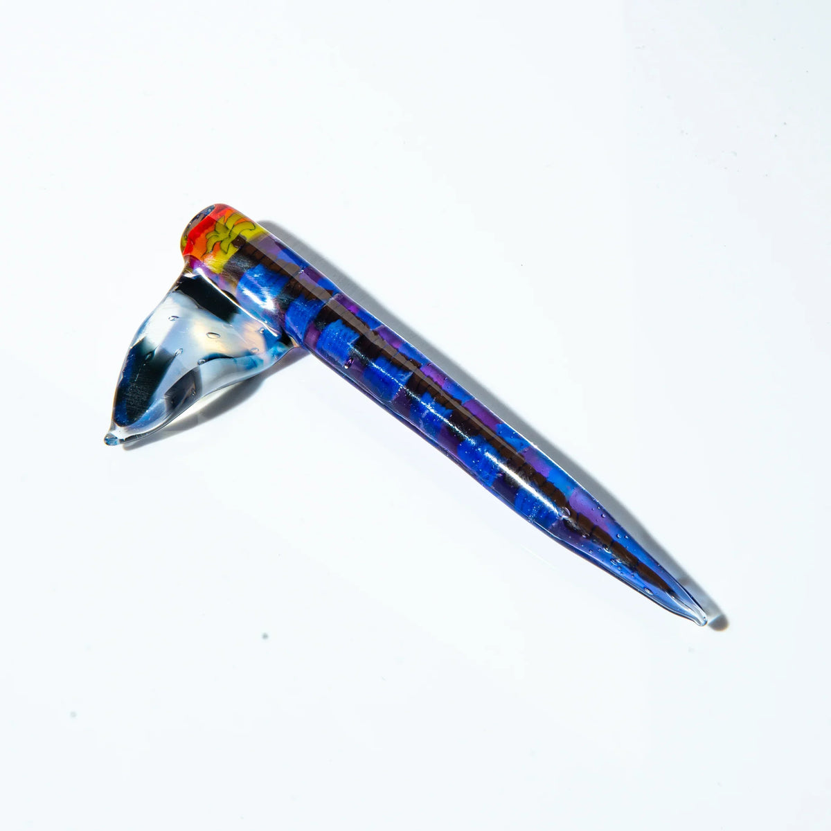Colorful glass dab tool with flag-inspired design and blue swirls on white background