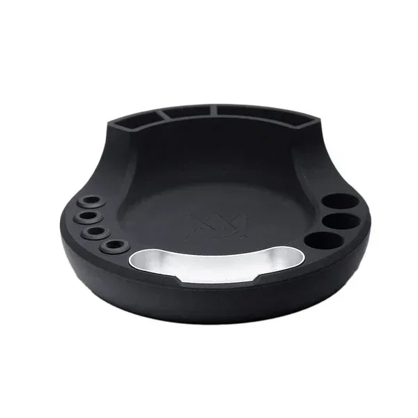 Black silicone smoking accessory tray with multiple slots and compartments, isolated on white