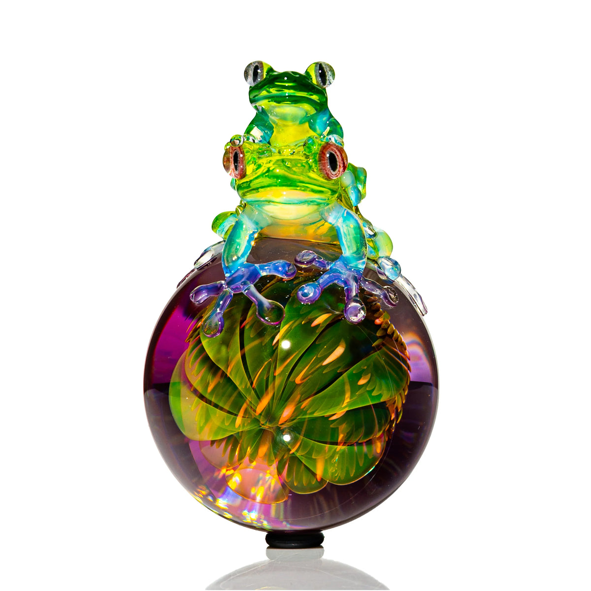 Hand-blown glass marble with a frog design by Eusheen x Kengtaro