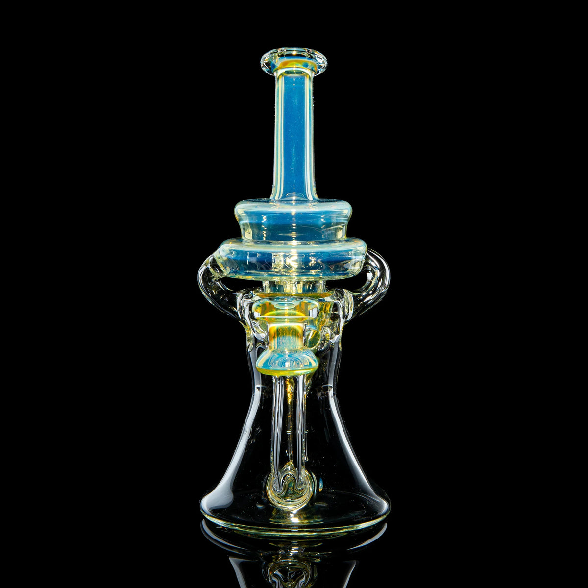 Heady glass water pipe with blue and yellow accents on a black background