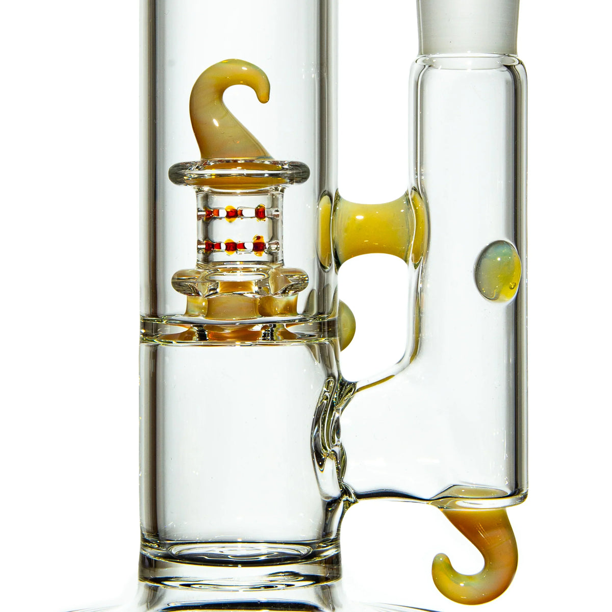 Clear glass water pipe with yellow accents and hook-shaped decorative features