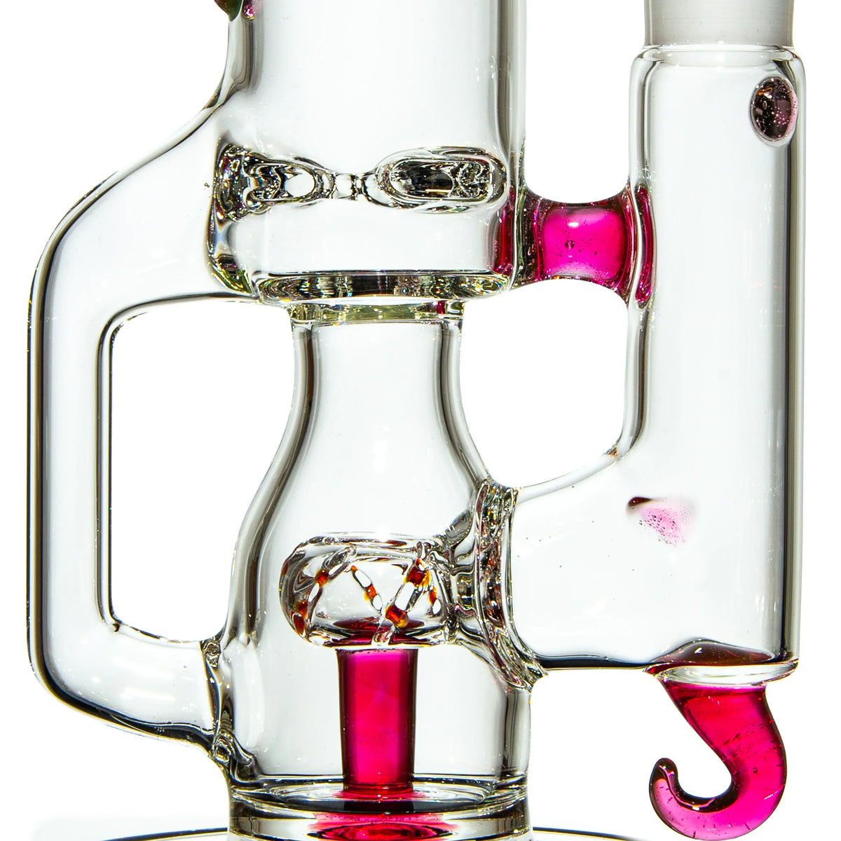 Heady glass water pipe with pink accents and artistic hook detail, close-up view.