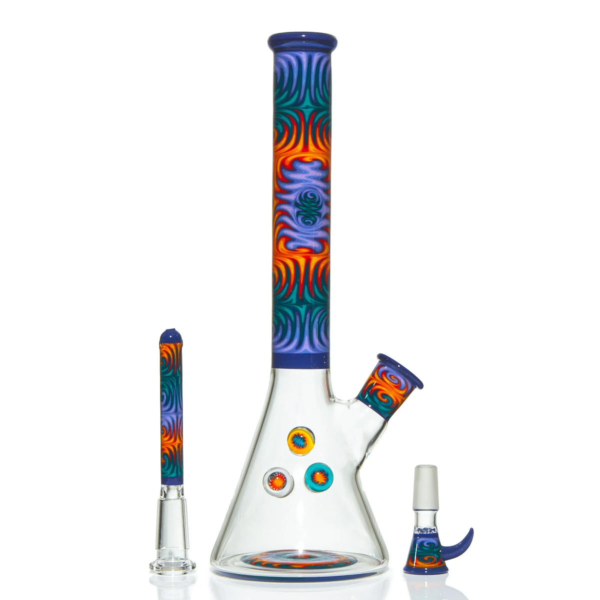 Heady glass beaker bong with colorful swirl accents and matching accessories on white background