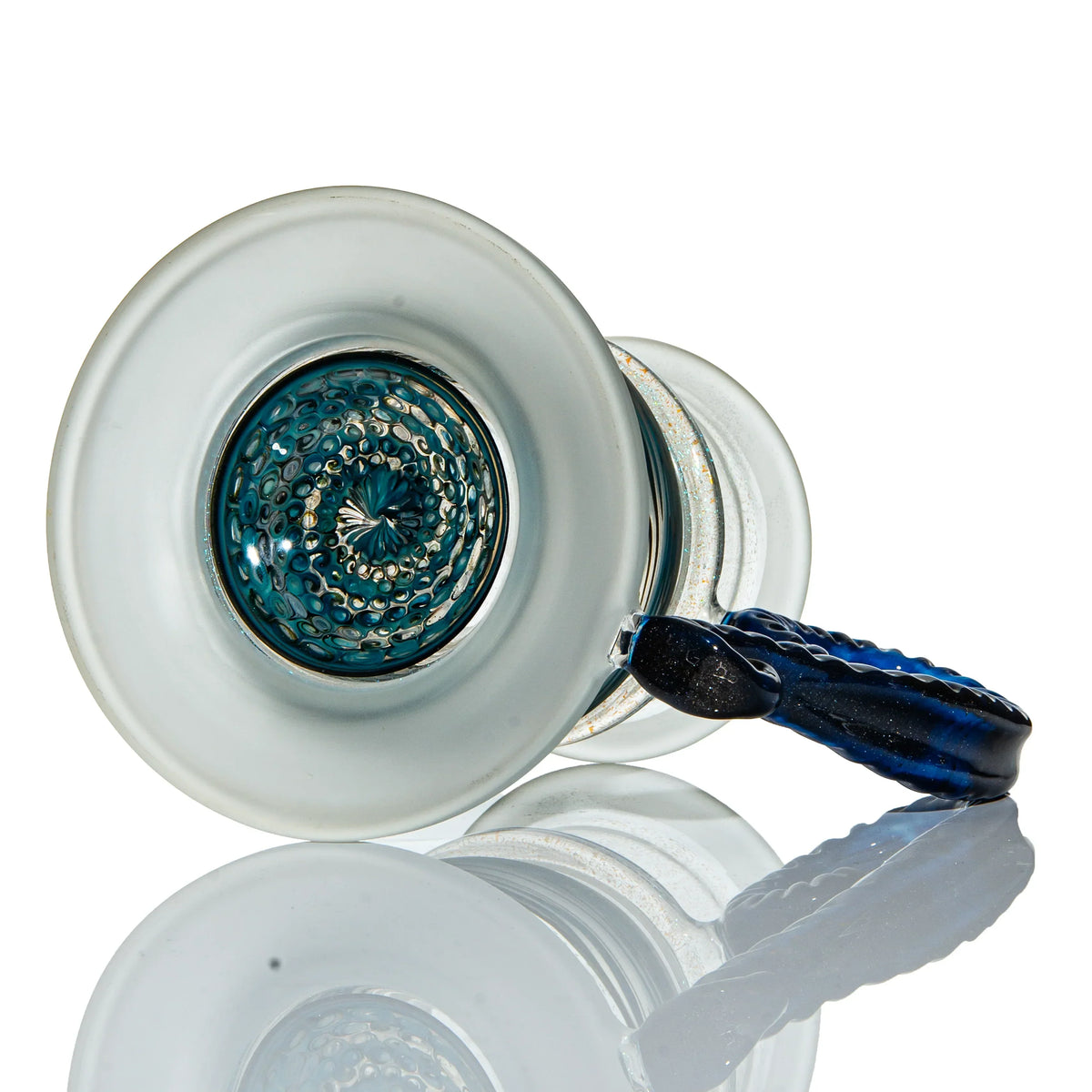 Intricate blue and clear glass pipe with textured handle and detailed spiral pattern