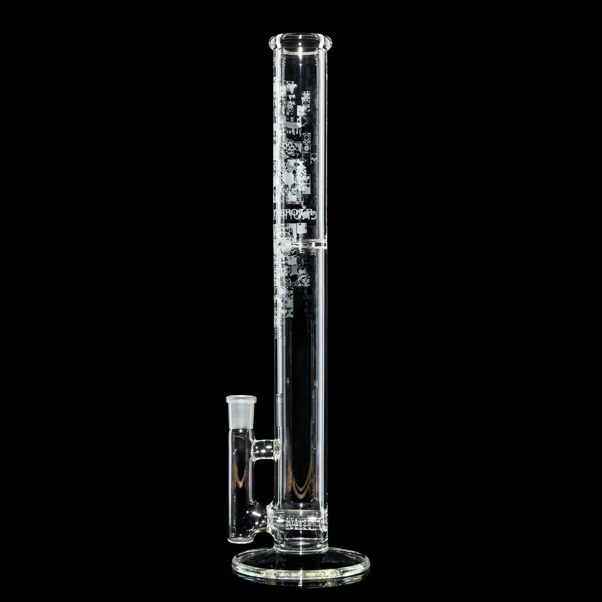 Tall clear glass water pipe with etched designs on a black background