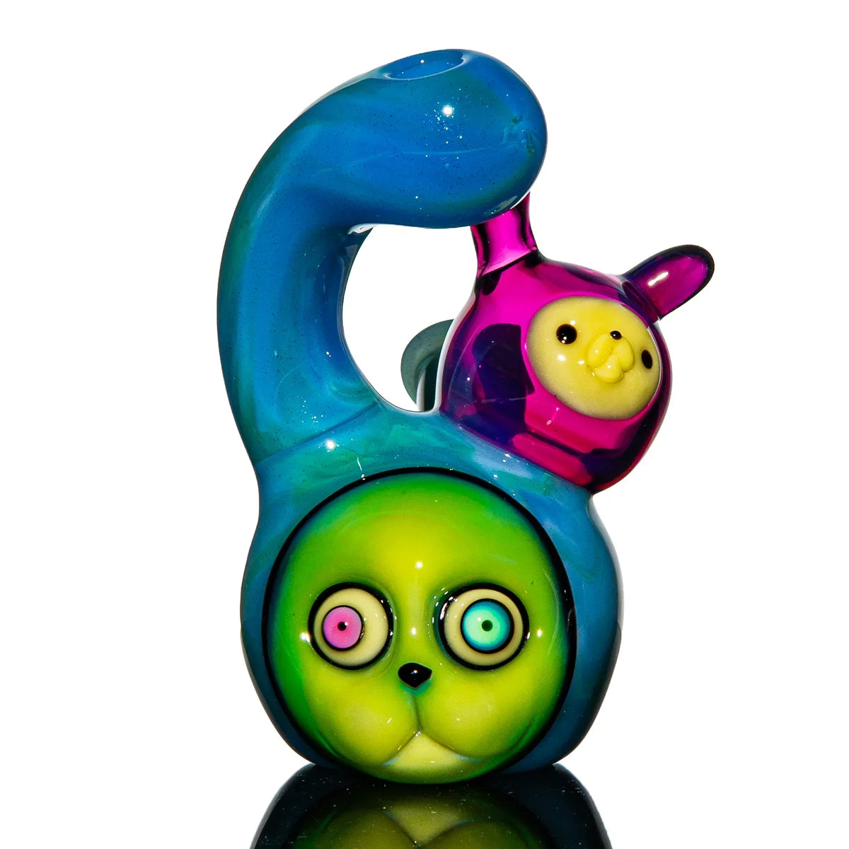 Colorful heady glass pipe with vibrant animal faces on a white background