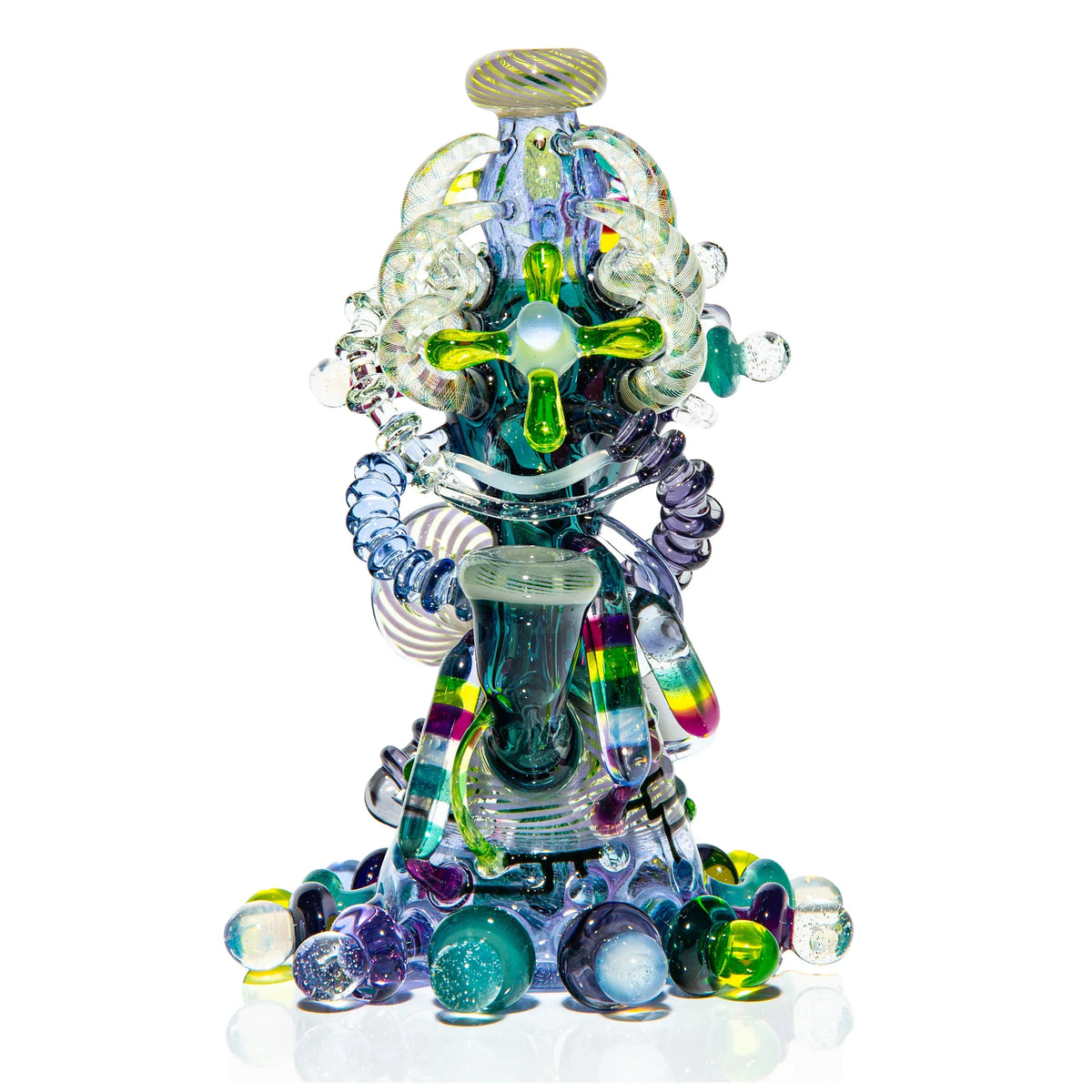 Heady glass water pipe with intricate, colorful patterns and sculptural details on white background.