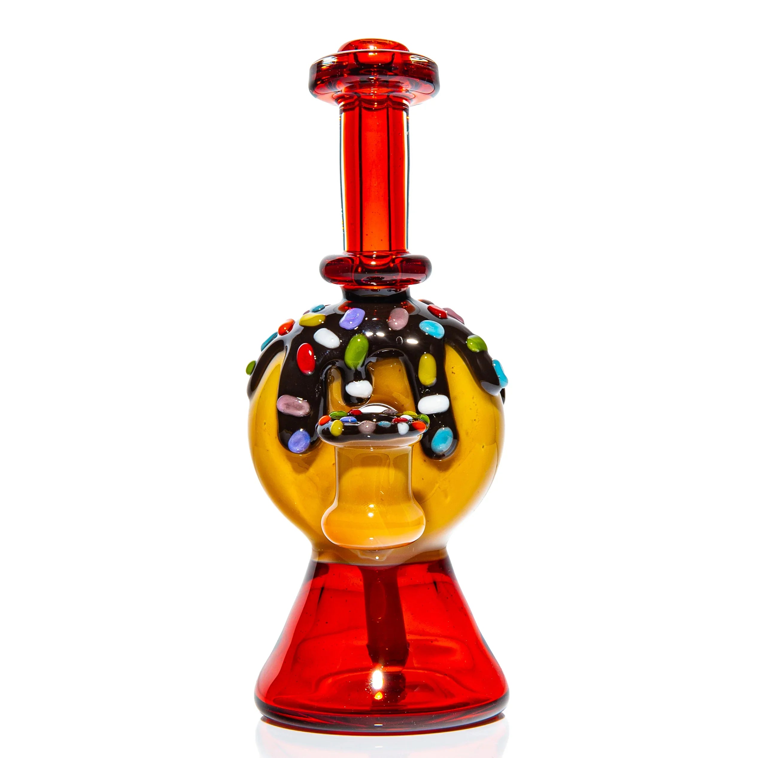 Colorful glass water pipe with candy sprinkle design, donut-shaped chamber, red and yellow accents