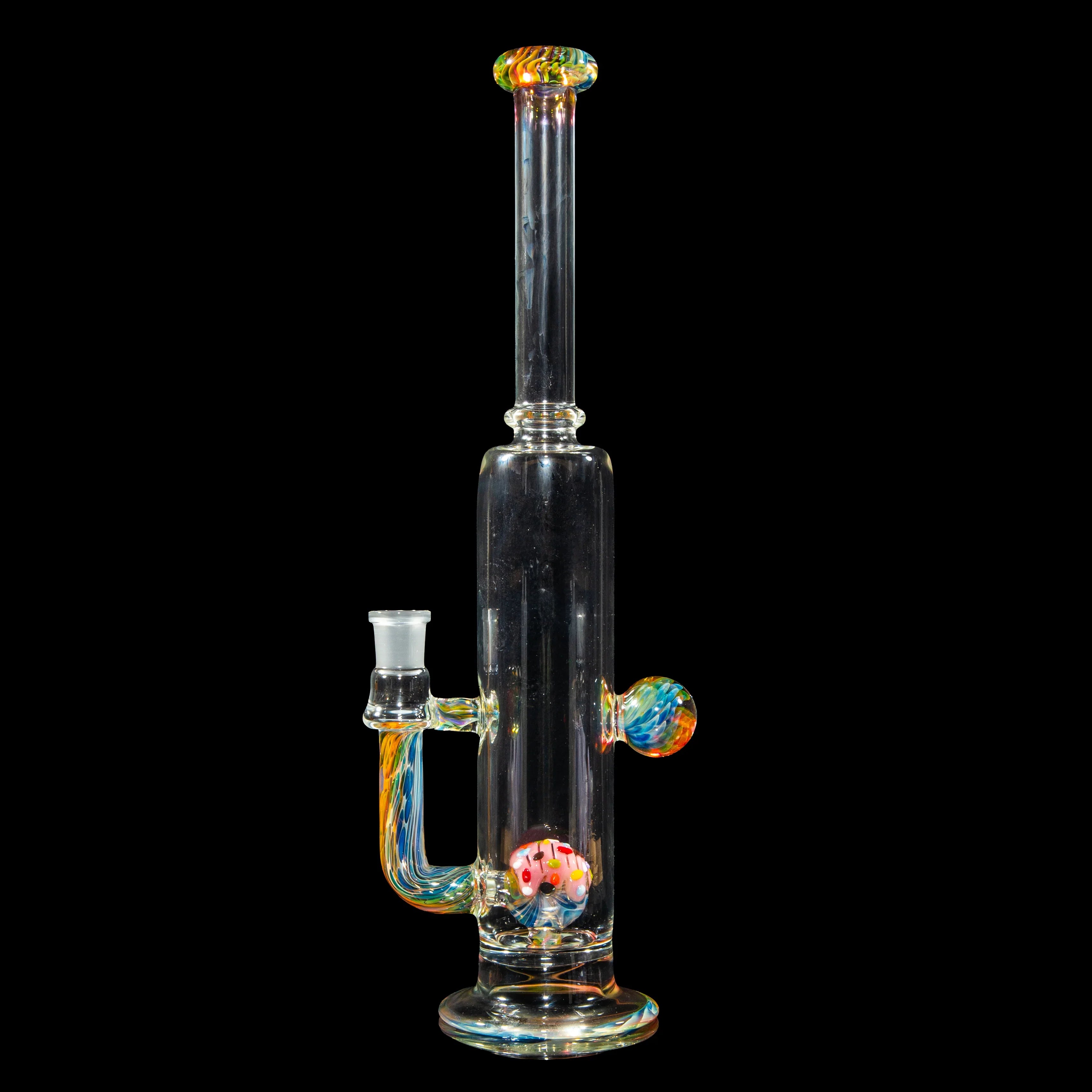 Heady glass water pipe with colorful accents and marble details on black background