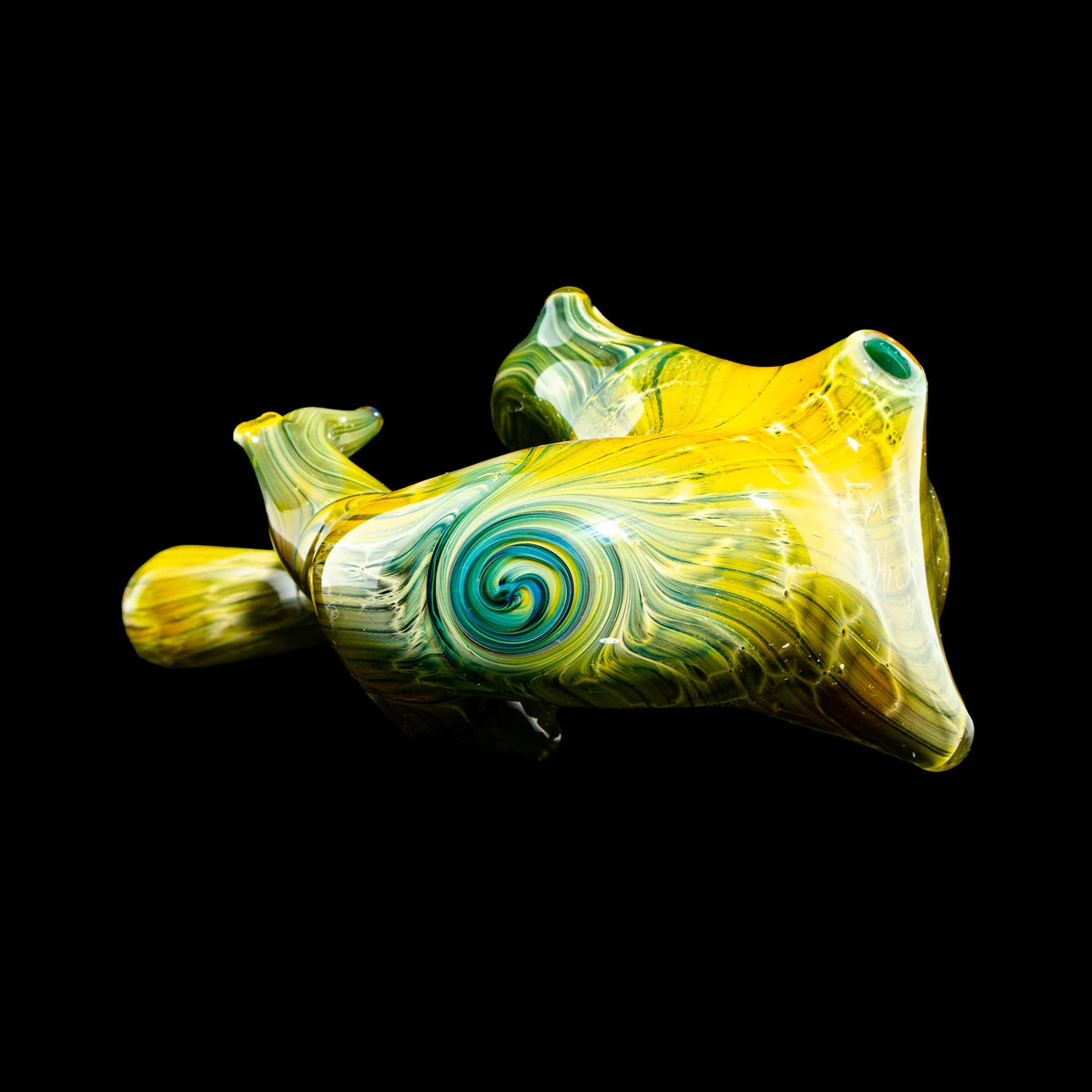 Hand-blown yellow and green glass pipe with blue swirl design on black background