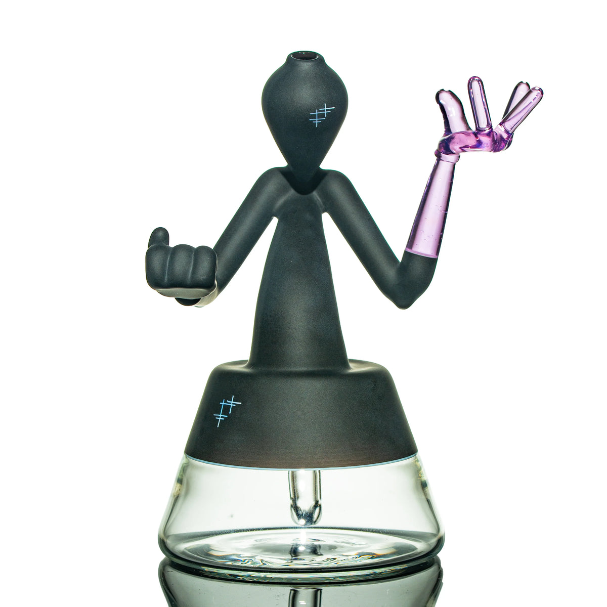 Heady glass art water pipe with matte black figure and purple glass hand on clear base
