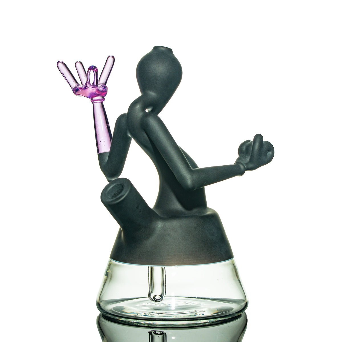 Black and purple heady glass water pipe with abstract figure design on white background