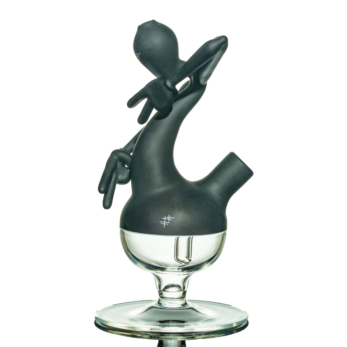 Sculpted matte black glass dab rig with abstract figure design on clear glass base