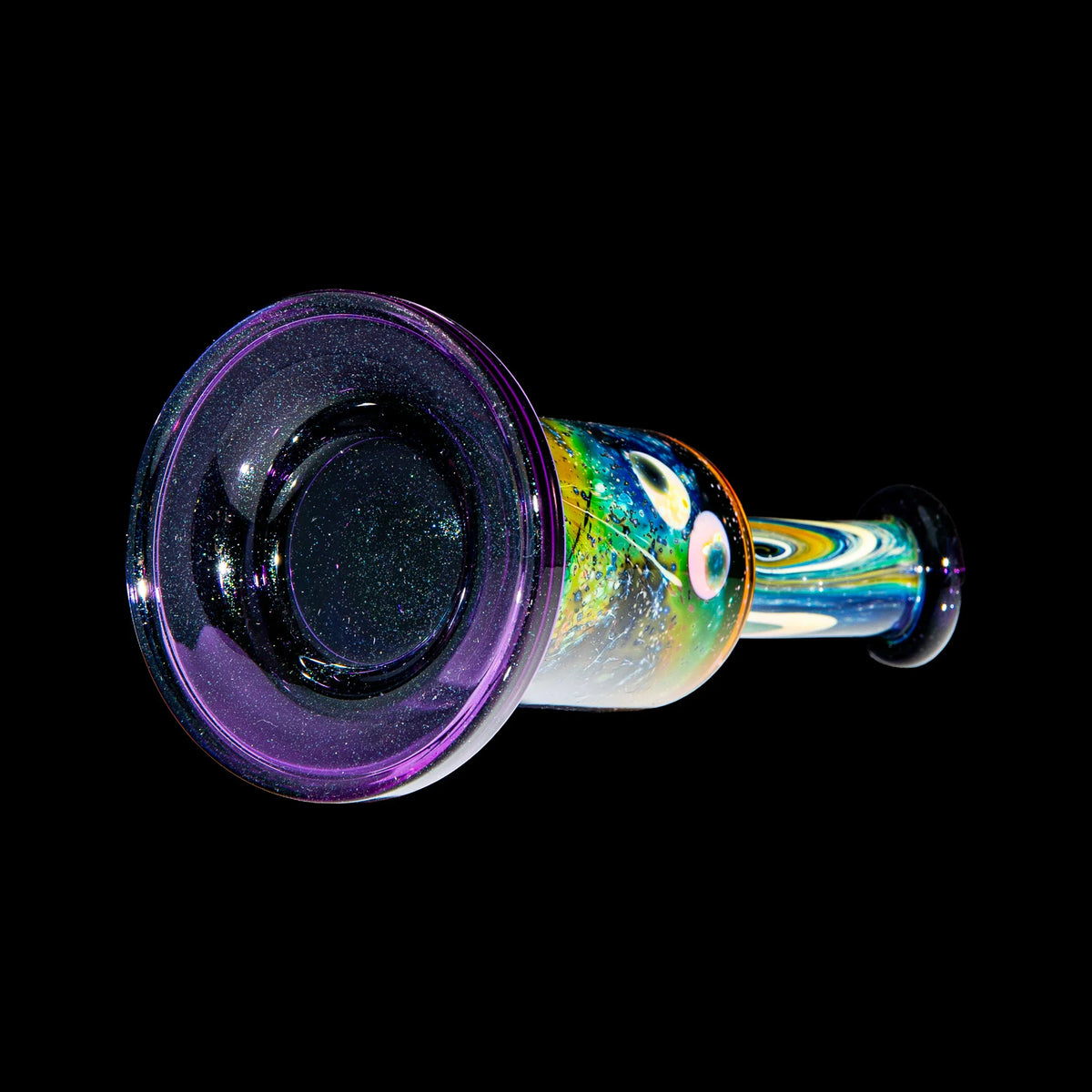 Colorful heady glass pipe with cosmic patterns and purple accents on a black background