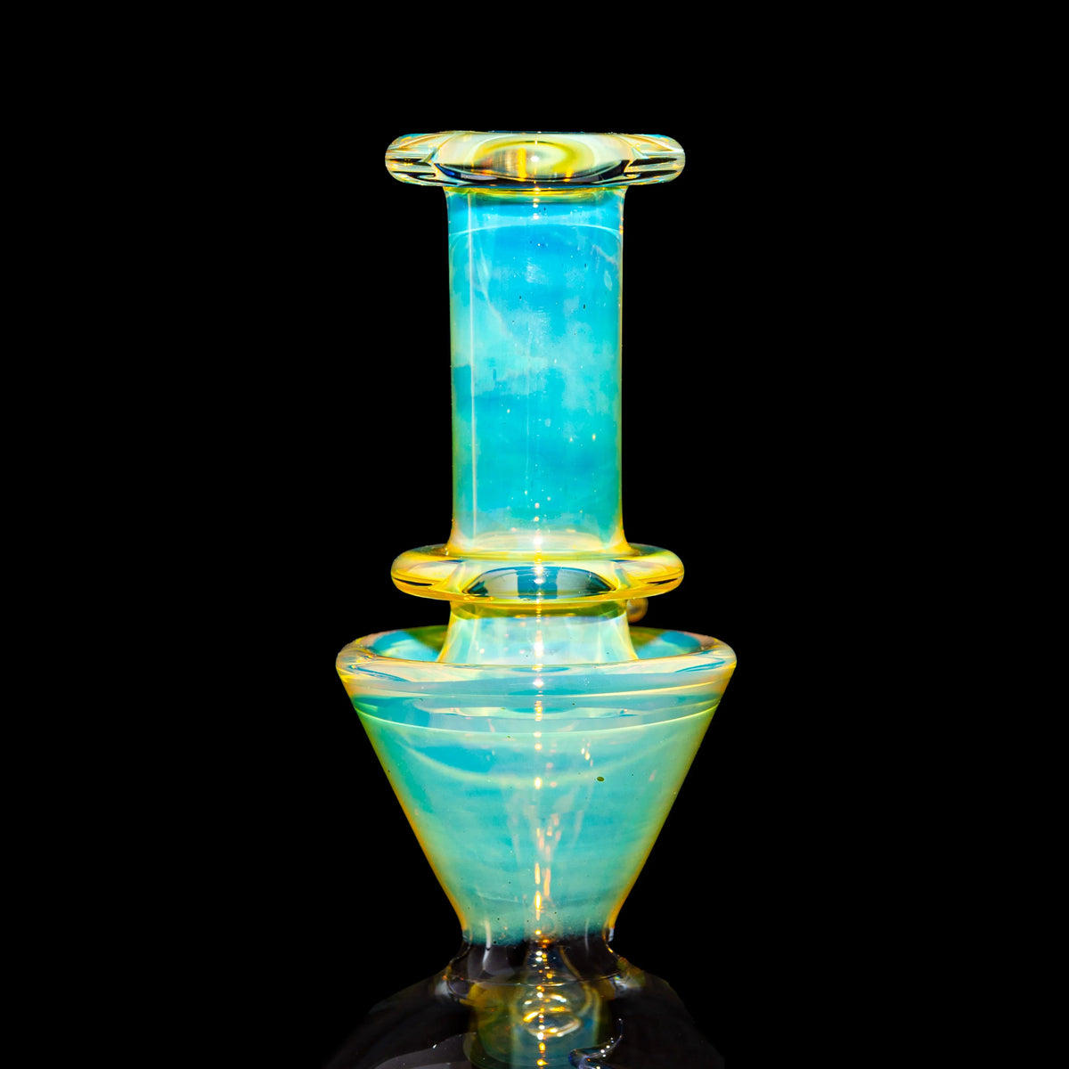 Heady glass water pipe with blue and yellow accents, displayed on a black background